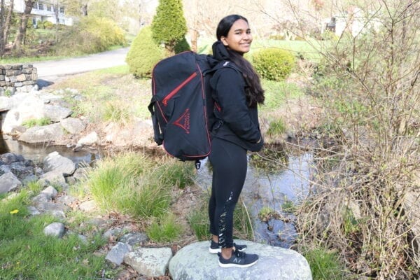 Sierra with a Backpack standing on a rock